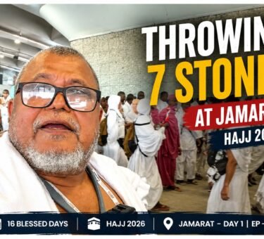 Pilgrim throwing seven pebbles at Jamarat al-Aqabah during Hajj 2026