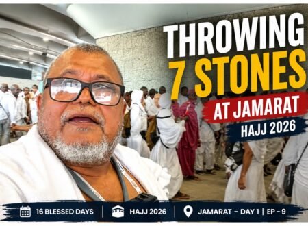 Pilgrim throwing seven pebbles at Jamarat al-Aqabah during Hajj 2026