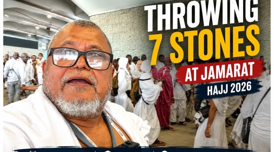 Pilgrim throwing seven pebbles at Jamarat al-Aqabah during Hajj 2026