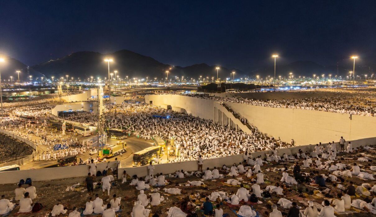 Pilgrims resting under the night sky in Muzdalifah during Hajj 2026