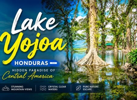 Scenic view of Lake Yojoa in Honduras surrounded by lush green mountains and tropical forests