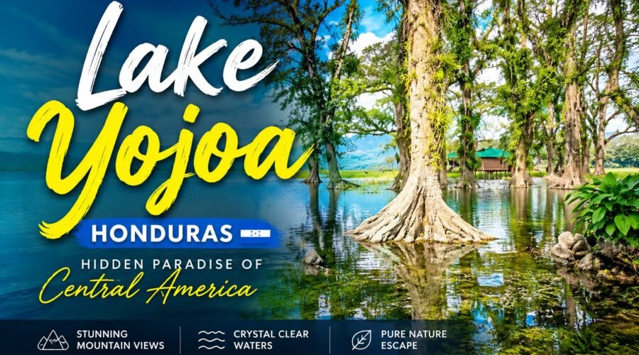 Scenic view of Lake Yojoa in Honduras surrounded by lush green mountains and tropical forests