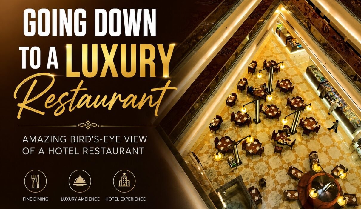 Luxury hotel restaurant viewed from above inside a modern atrium