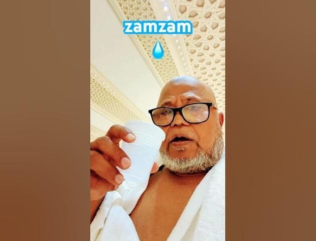 Pilgrims drinking Zamzam water at Masjid al-Haram in Makkah