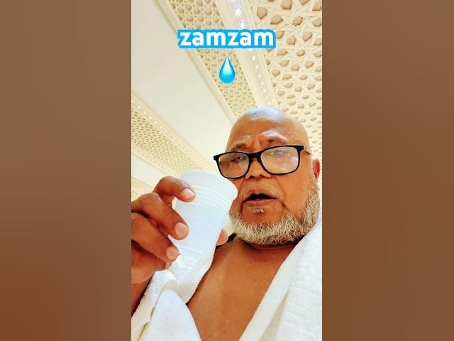 Pilgrims drinking Zamzam water at Masjid al-Haram in Makkah
